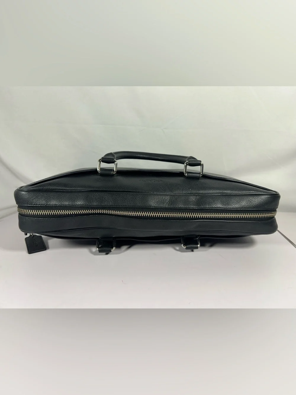 4099: NWT Coach Beckett Slim Brief Black Leather Laptop Bag Scratched Side